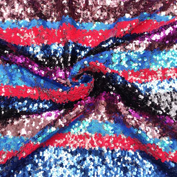 Tessuto Tulle ricamato con paillettes motivo rigato azzurro - fucsia - rosso - rosa