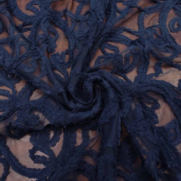 Tessuto Tulle elasticizzato ricamato 3d motivo astratto blu