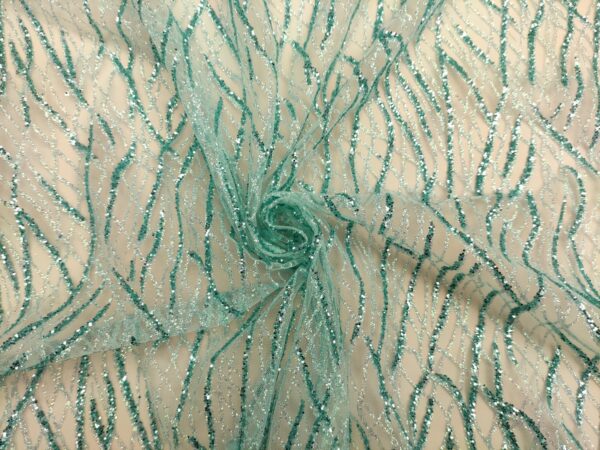 Tessuto Tulle mano seta con Glitter motivo astratto acquamarina