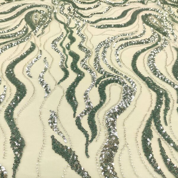 Tessuto tulle - pizzo mano seta ricamato con pietre e con paillettes motivo astratto verde menta