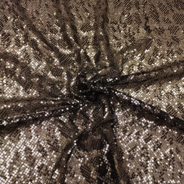 Tessuto Tulle mano seta ricamato con paillettes motivo animalier nero - argento