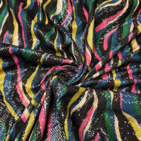 Tessuto Tulle Elasticizzato Ricamato con paillettes motivo animalier nero - fucsia - giallo - verde