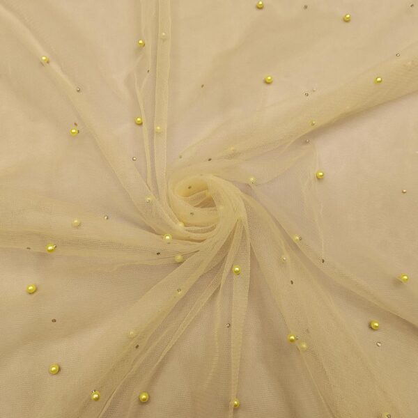 Tessuto Tulle mano seta ricamato con perle e con strass giallo