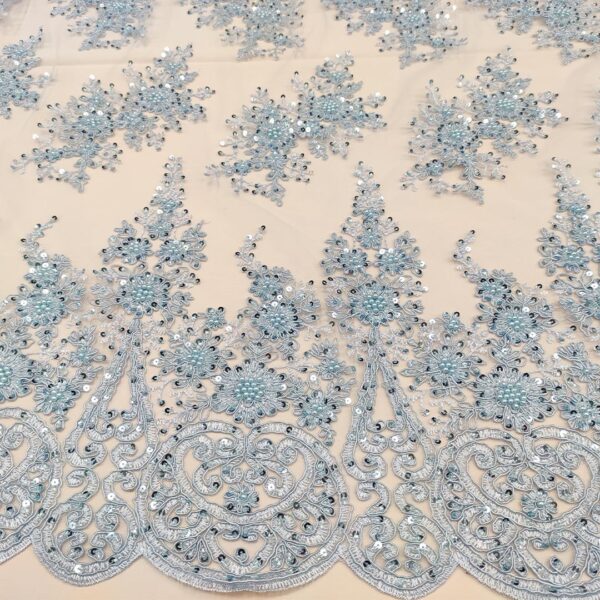 Tessuto Tulle mano seta doppio smerlo ricamato con paillettes e con perline motivo floreale celeste