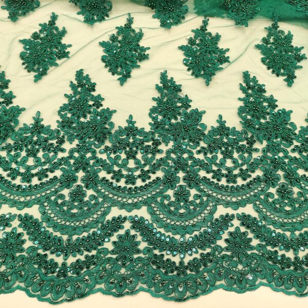 Tessuto Tulle mano seta doppio smerlo ricamato con paillettes e con perline motivo floreale barocco verde petrolio