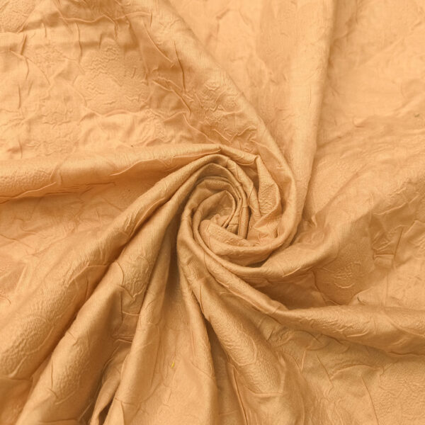 Tessuto Mussola di cotone effetto stropicciato tinta unita rosa pesco