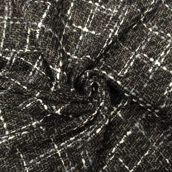 Tessuto Tweed Bouclé motivo quadri nero - grigio - bianco