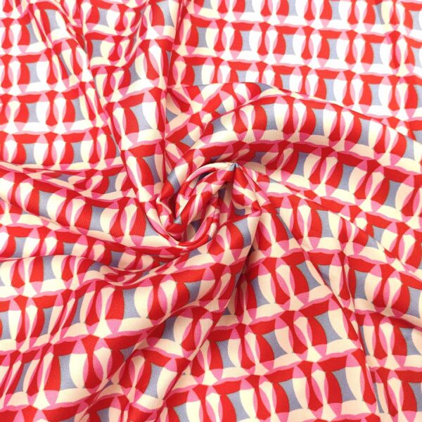 Tessuto Twill a fantasia motivo astratto rosso - rosa - bianco