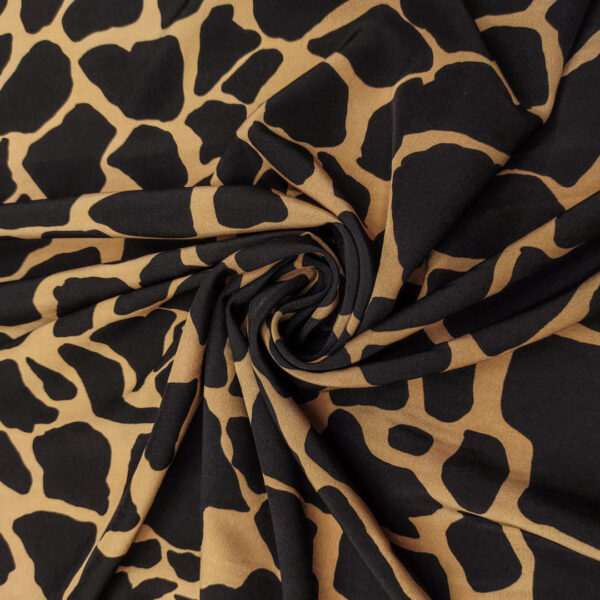 Tessuto Viscosa a fantasia motivo animalier beige - marrone