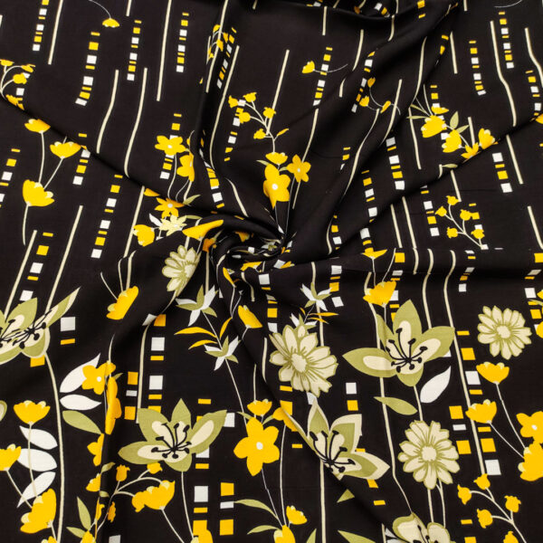 Tessuto Viscosa a fantasia motivo floreale nero - arancio