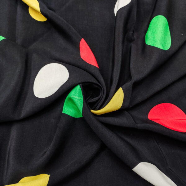 Tessuto Viscosa a fantasia motivo pois nero - giallo - rosso