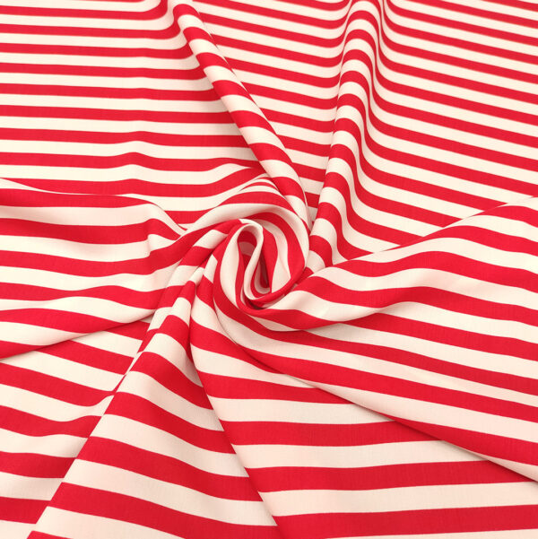 Tessuto Viscosa a fantasia motivo rigato rosso - bianco