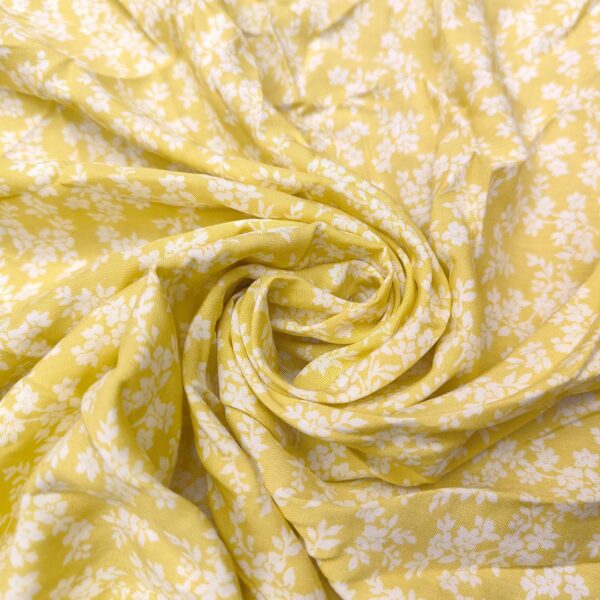 Tessuto Viscosa a fantasia motivo floreale giallo - bianco