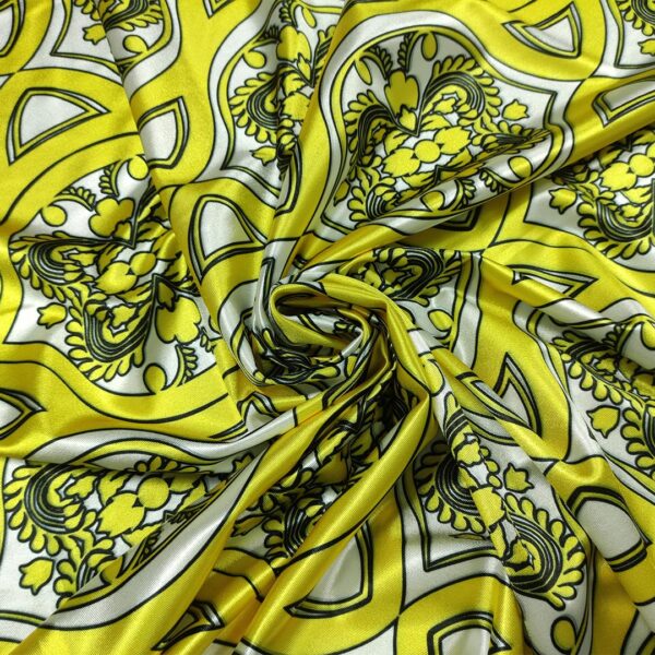 Tessuto Lycra lucida a fantasia motivo astratto giallo - bianco
