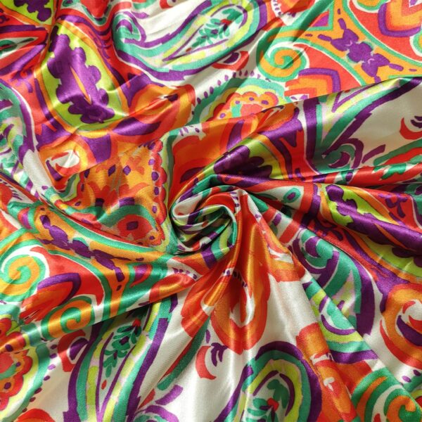 Tessuto Lycra lucida a fantasia motivo astratto viola - lime - arancione - verde