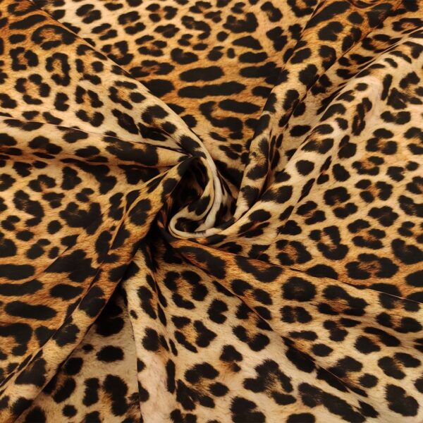 Tessuto Cady elasticizzato a fantasia motivo animalier beige - marrone