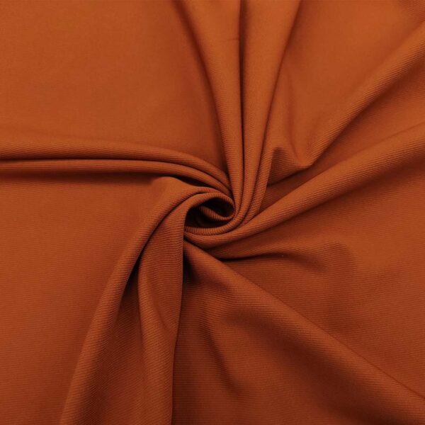 Tessuto Cady Elasticizzato motivo diagonale tinta unita ruggine