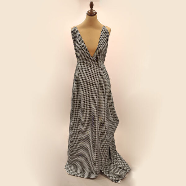 Tessuto Cady elasticizzato a fantasia motivo geometrico nero - bianco