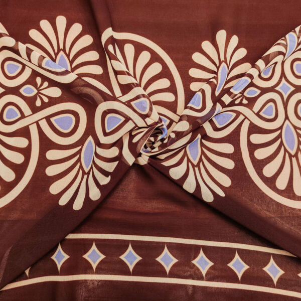 Tessuto Chiffon a fantasia motivo astratto marrone - beige - azzurro