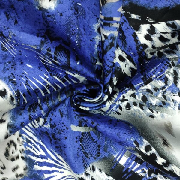 Tessuto Cotone a fantasia motivo astratto blu elettrico - nero - grigio