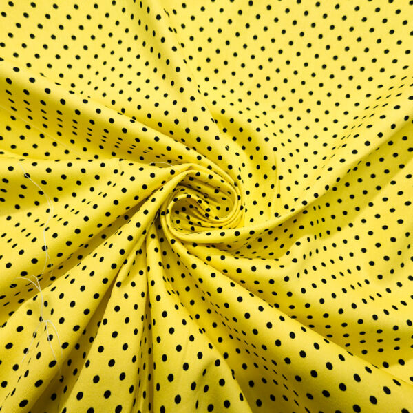 Tessuto Cotone a fantasia motivo pois piccoli giallo - nero