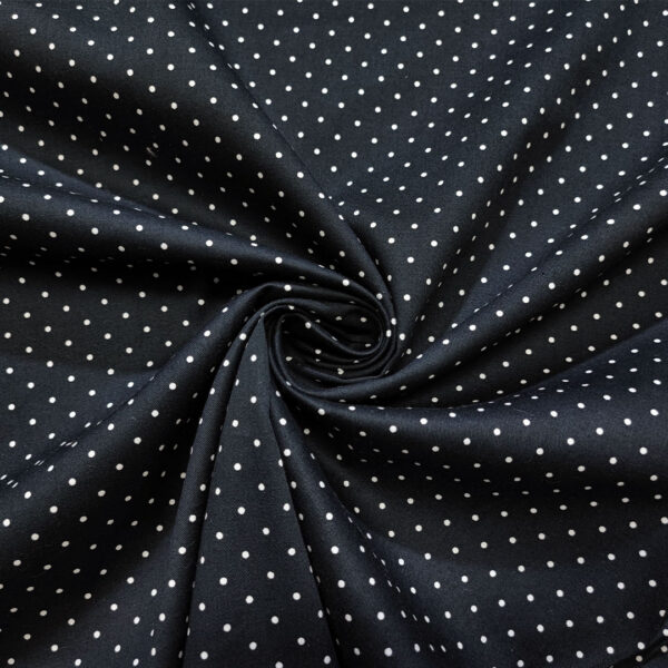 Tessuto Cotone a fantasia motivo pois piccoli nero - bianco
