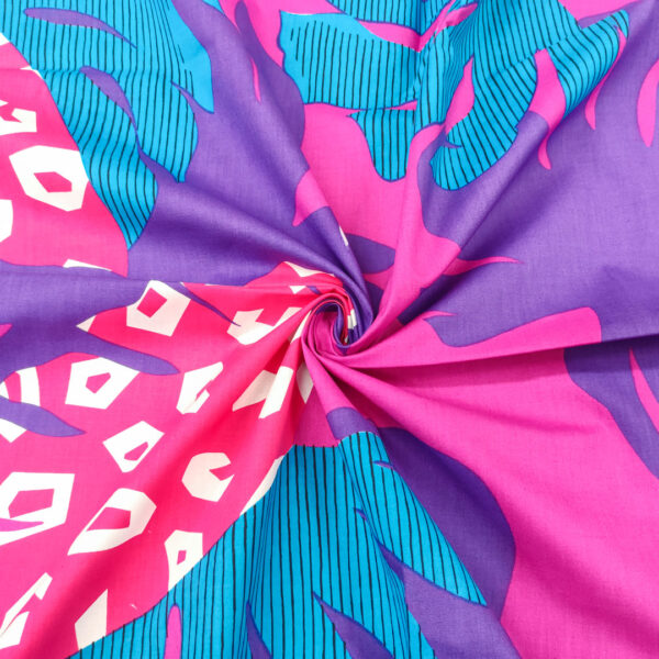 Tessuto Cotone leggero a fantasia motivo astratto magenta - turchese - viola