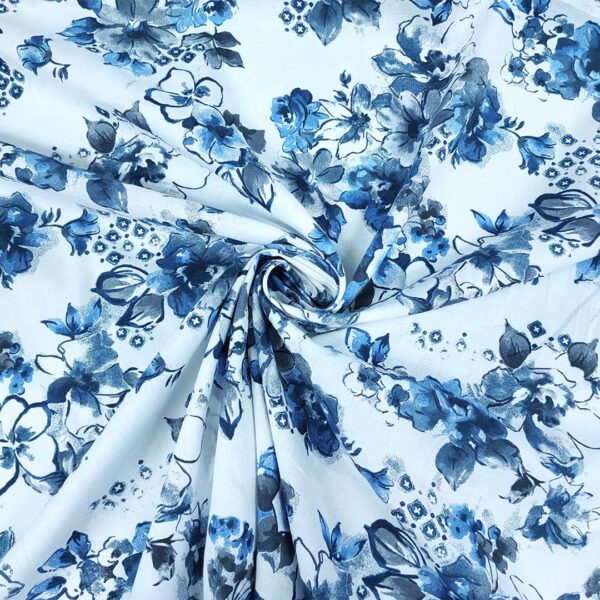 Tessuto Cotone leggero a fantasia motivo floreale bianco - carta da zucchero - blu navy