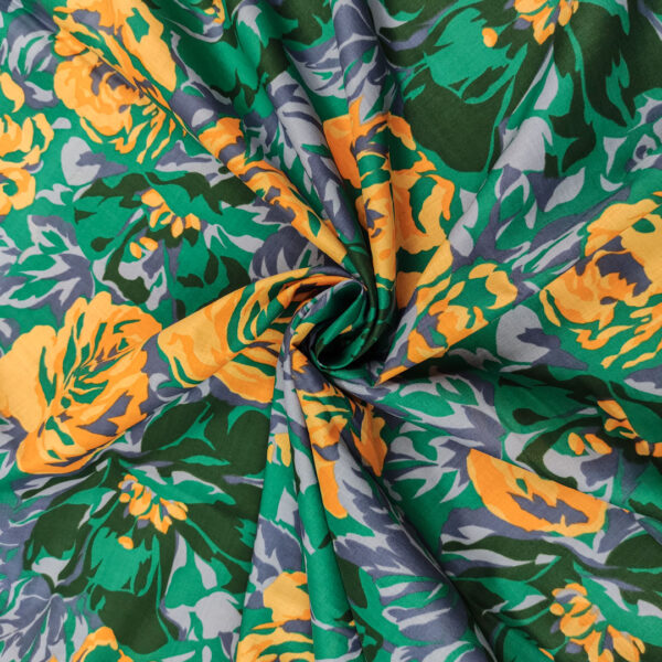 Tessuto Cotone leggero a fantasia motivo floreale verde - arancio - viola
