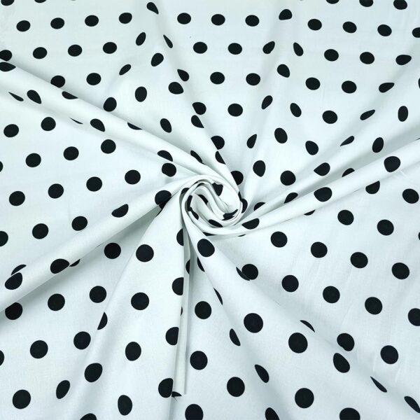 Tessuto Cotone leggero a fantasia motivo pois bianco - nero