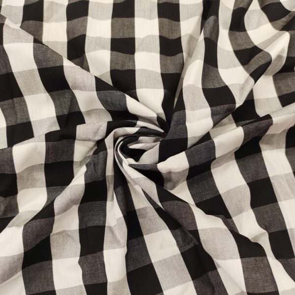 Tessuto Cotone leggero a fantasia motivo quadri bianco - nero