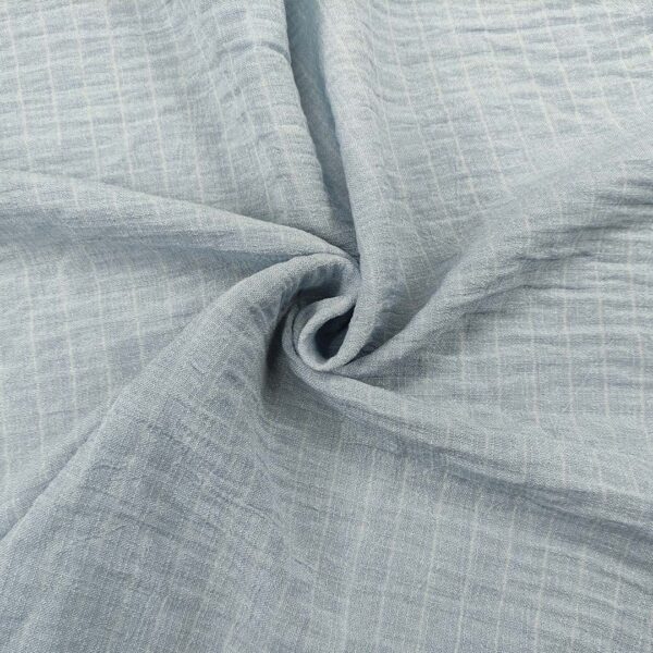 Tessuto Crepe a fantasia effetto lino motivo gessato celeste - bianco