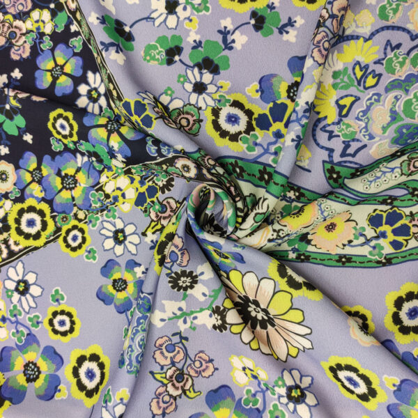 Tessuto Crepe a fantasia motivo floreale cashmere lilla - giallo nero