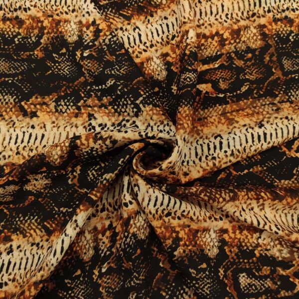 Tessuto Crepe a fantasia motivo animalier beige - marrone - bronzo