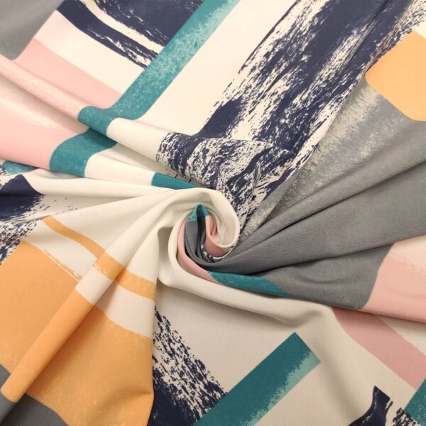 Tessuto Crepe a fantasia motivo astratto bianco - arancione - rosa - blu