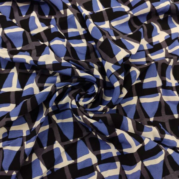 Tessuto Crepe a fantasia motivo astratto indaco - bianco - nero