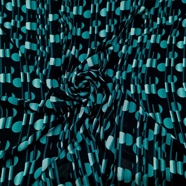 Tessuto Crepe a fantasia motivo geometrico verde petrolio - nero