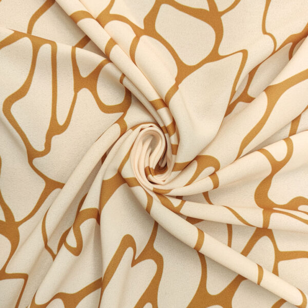 Tessuto Crepe a fantasia motivo astratto beige - panna