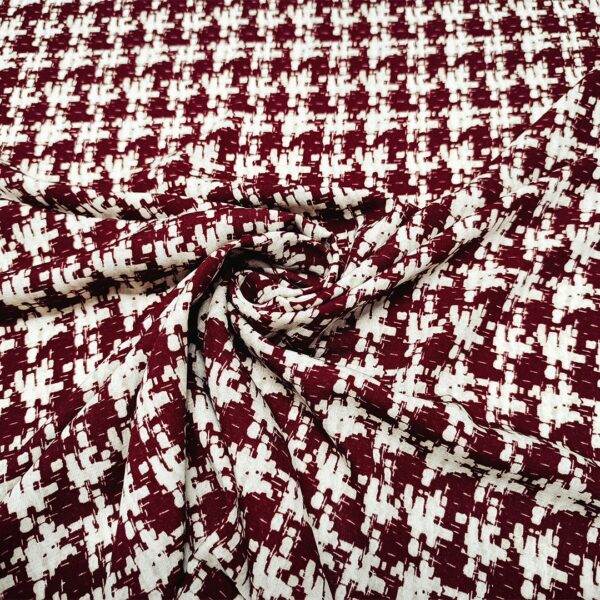 Tessuto Crepe a fantasia motivo astratto panna - bordeaux