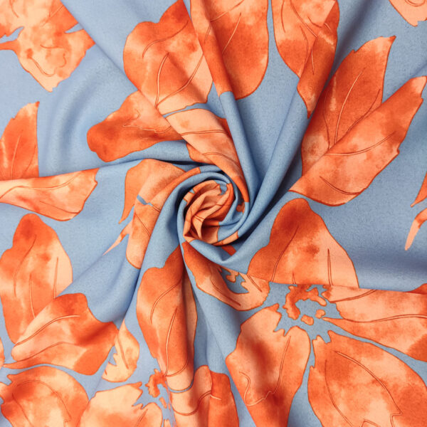 Tessuto Crepe a fantasia motivo floreale azzurro - arancio