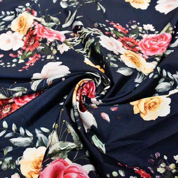 Tessuto Crepe a fantasia motivo floreale blu - rosa - giallo