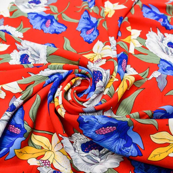 Tessuto Crepe a fantasia motivo floreale rosso - giallo - blu elettrico