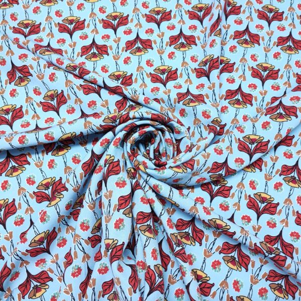 Tessuto Crepe a fantasia motivo floreale celeste - rosso - ocra