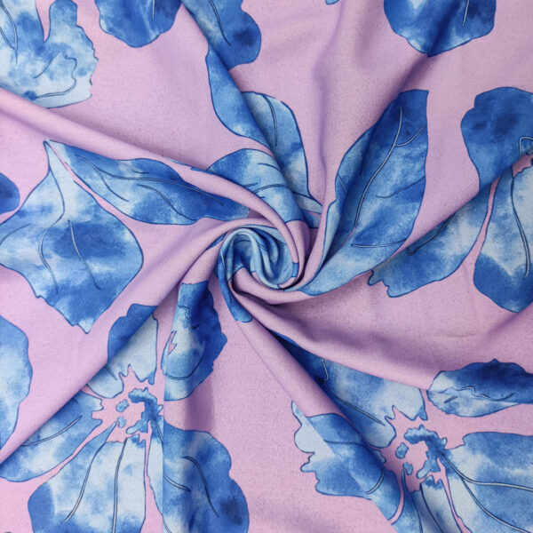 Tessuto Crepe a fantasia motivo floreale glicine - azzurro