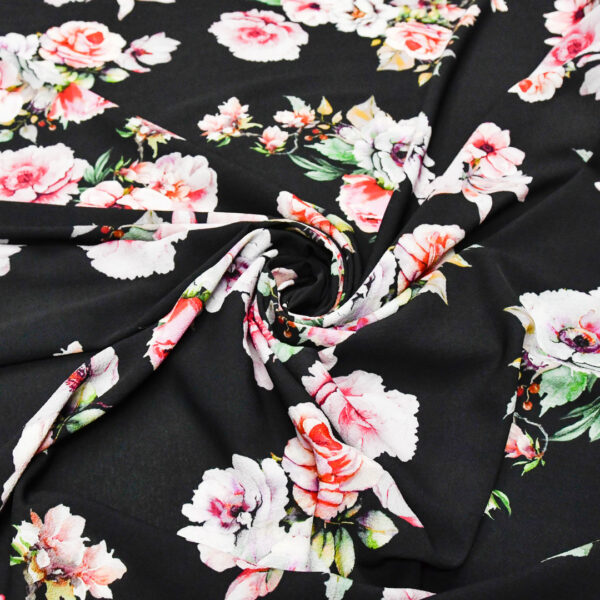 Tessuto Crepe a fantasia motivo floreale nero - rosa - bianco