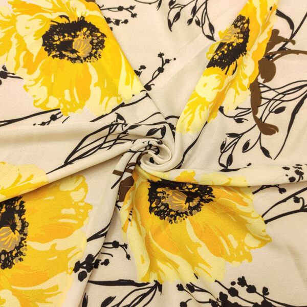Tessuto Crepe leggero a fantasia motivo floreale panna - nero - giallo