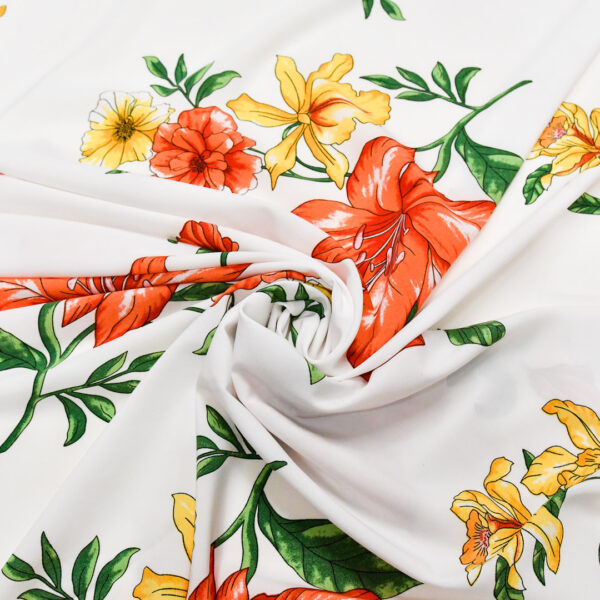 Tessuto Crepe a fantasia motivo floreale giallo - verde - rosso