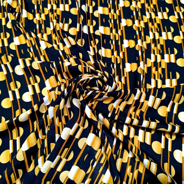Tessuto Crepe a fantasia motivo geometrico giallo - nero - ocra