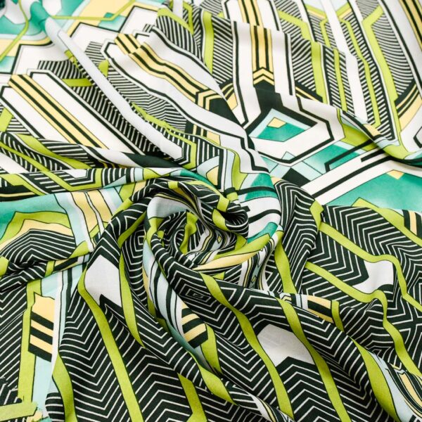 Tessuto Crepe a fantasia motivo verde prato - giallo