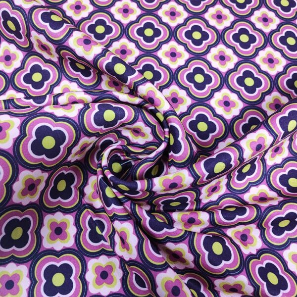 Tessuto Crepe a fantasia motivo geometrico viola - glicine - lime